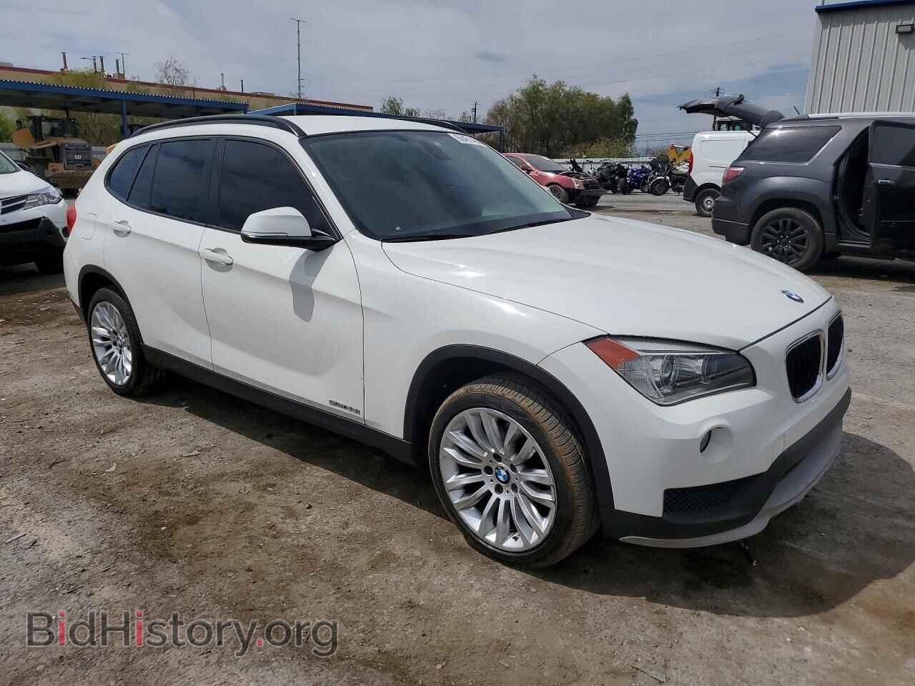 2015 BMW X1 - VIN: WBAVM1C59FV314827 - Photo 4