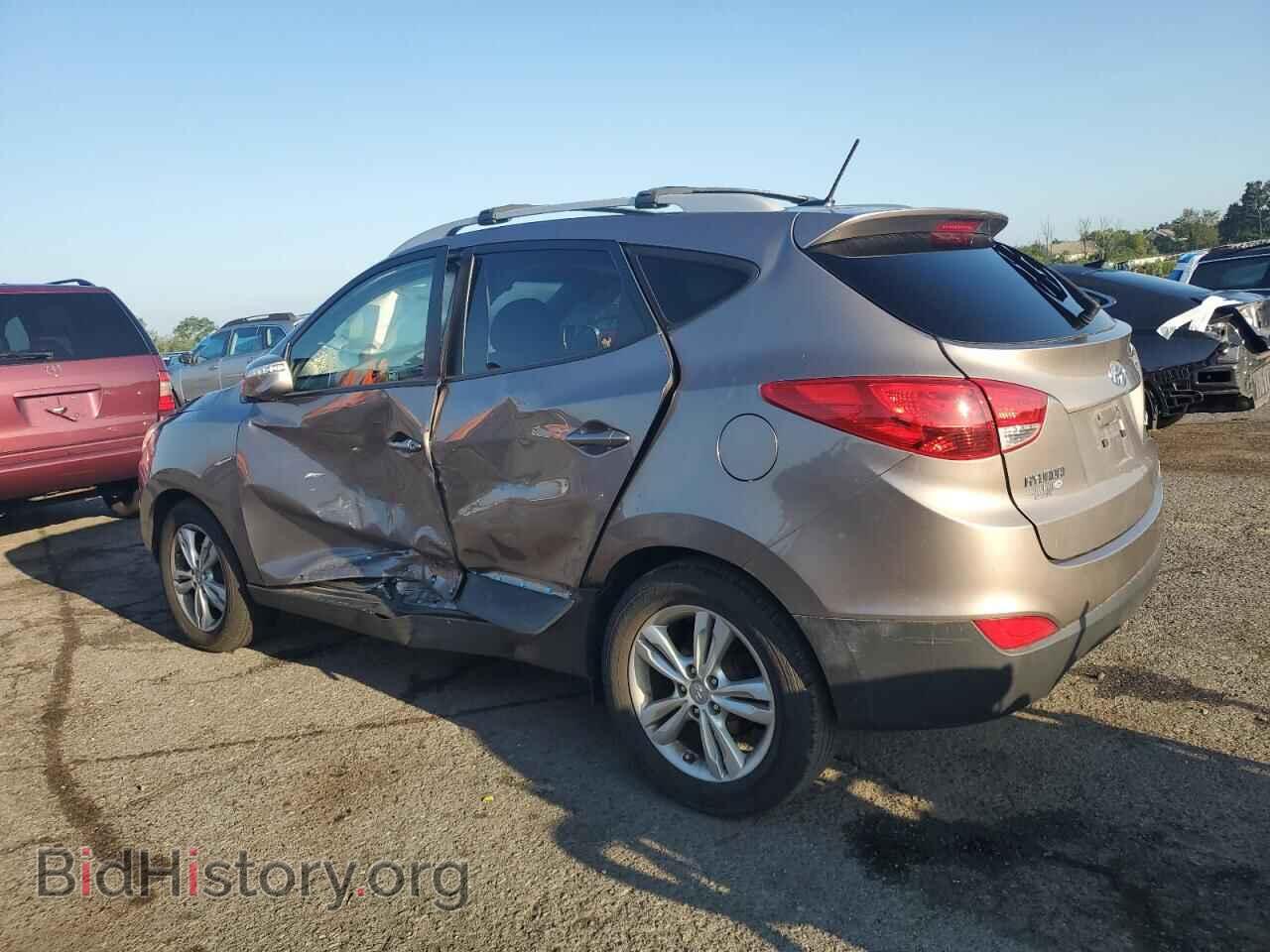 2012 HYUNDAI TUCSON - VIN: KM8JUCAC4CU420629 - Фото 2