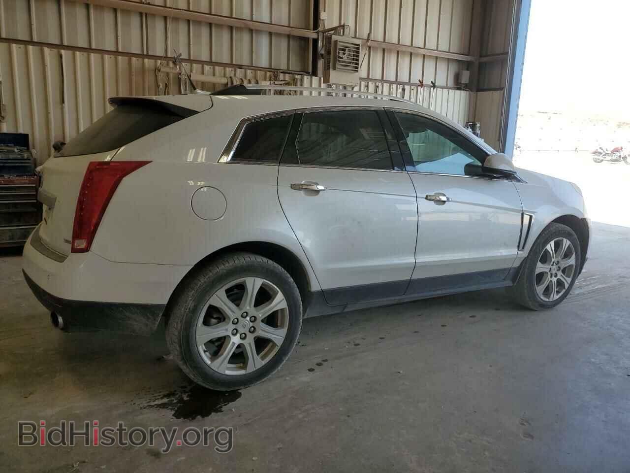 2014 CADILLAC SRX - VIN: 3GYFNCE3XES682363 - Фото 3