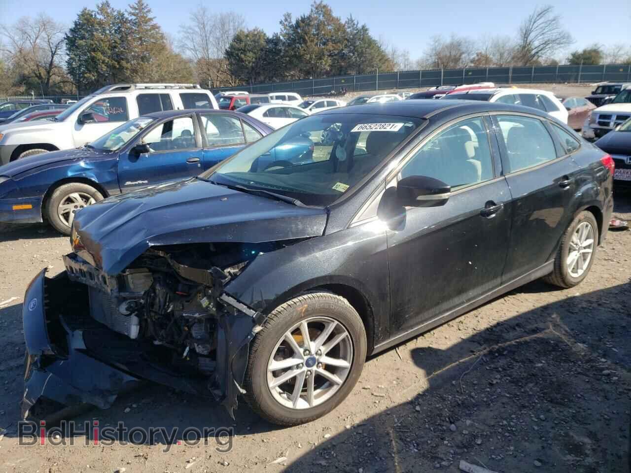 2015 FORD FOCUS - VIN: 1FADP3F21FL262713 - Photo 2