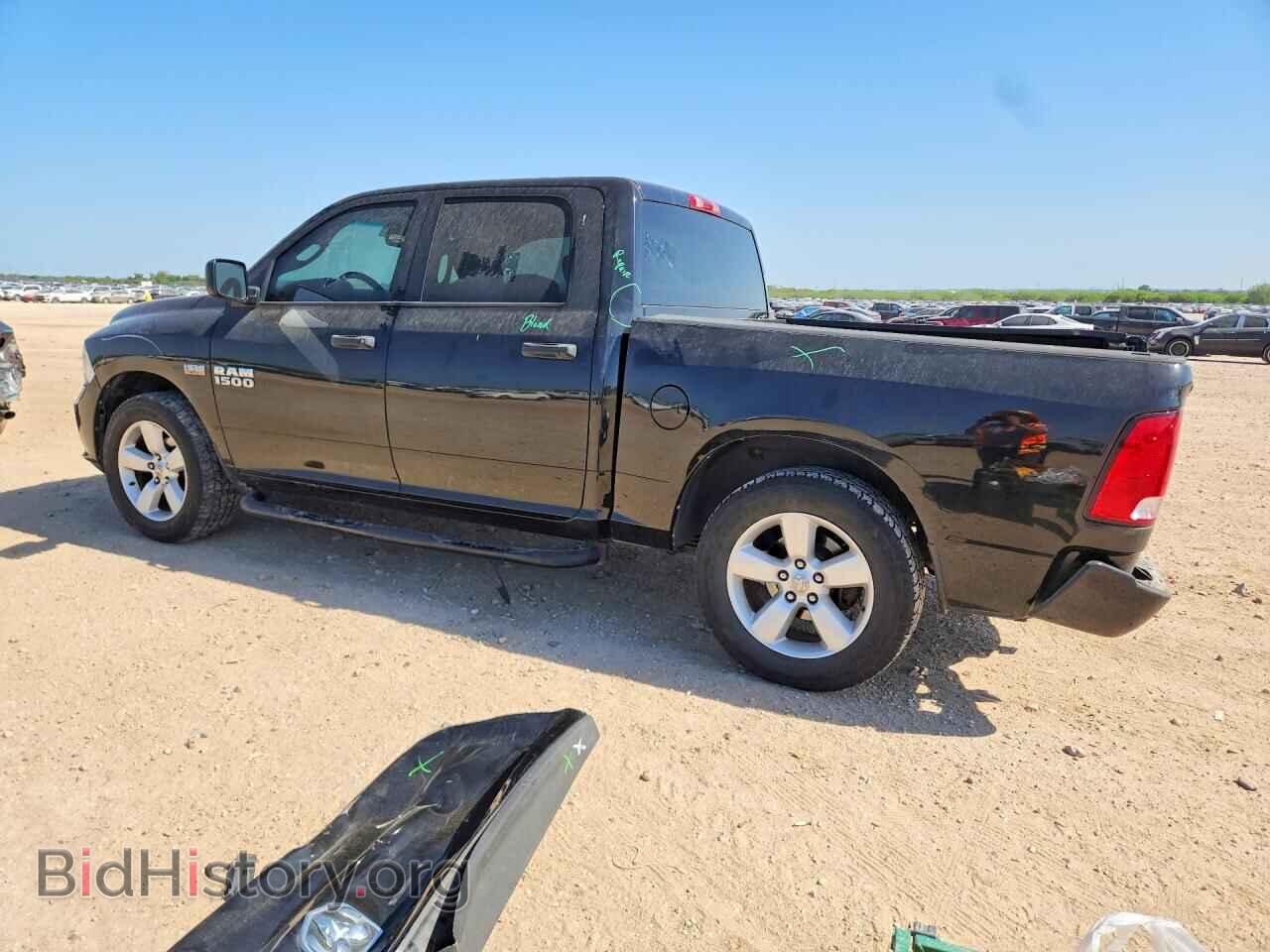 2015 RAM 1500 - VIN: 3C6RR6KT1FG698945 - Фото 2