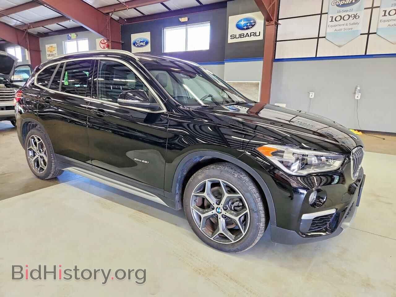 2017 BMW X1 - VIN: WBXHT3C37H5F85875 - Фото 4