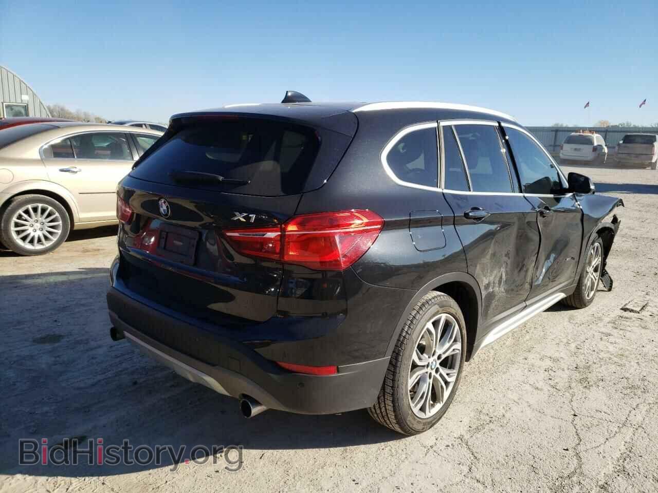 2017 BMW X1 - VIN: WBXHT3Z37H4A52373 - Фото 4