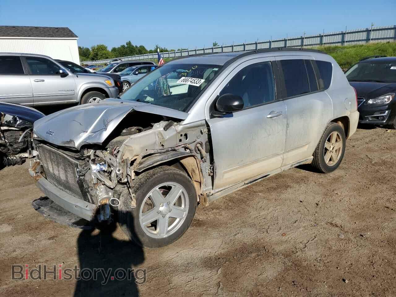 Photo 1J4NF4FB0AD529697 - JEEP COMPASS 2010