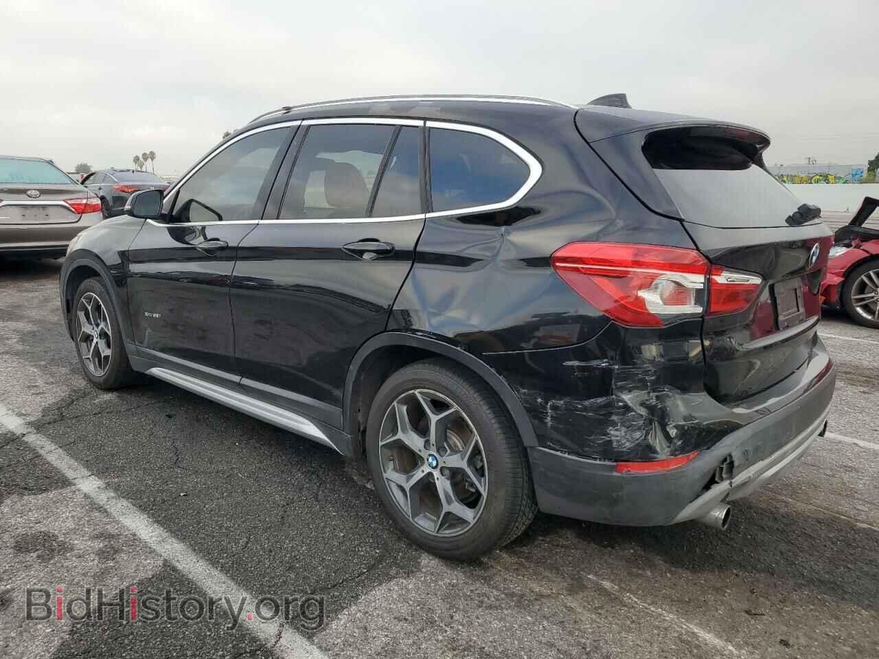 2016 BMW X1 - VIN: WBXHT3C32G5F66021 - Фото 2