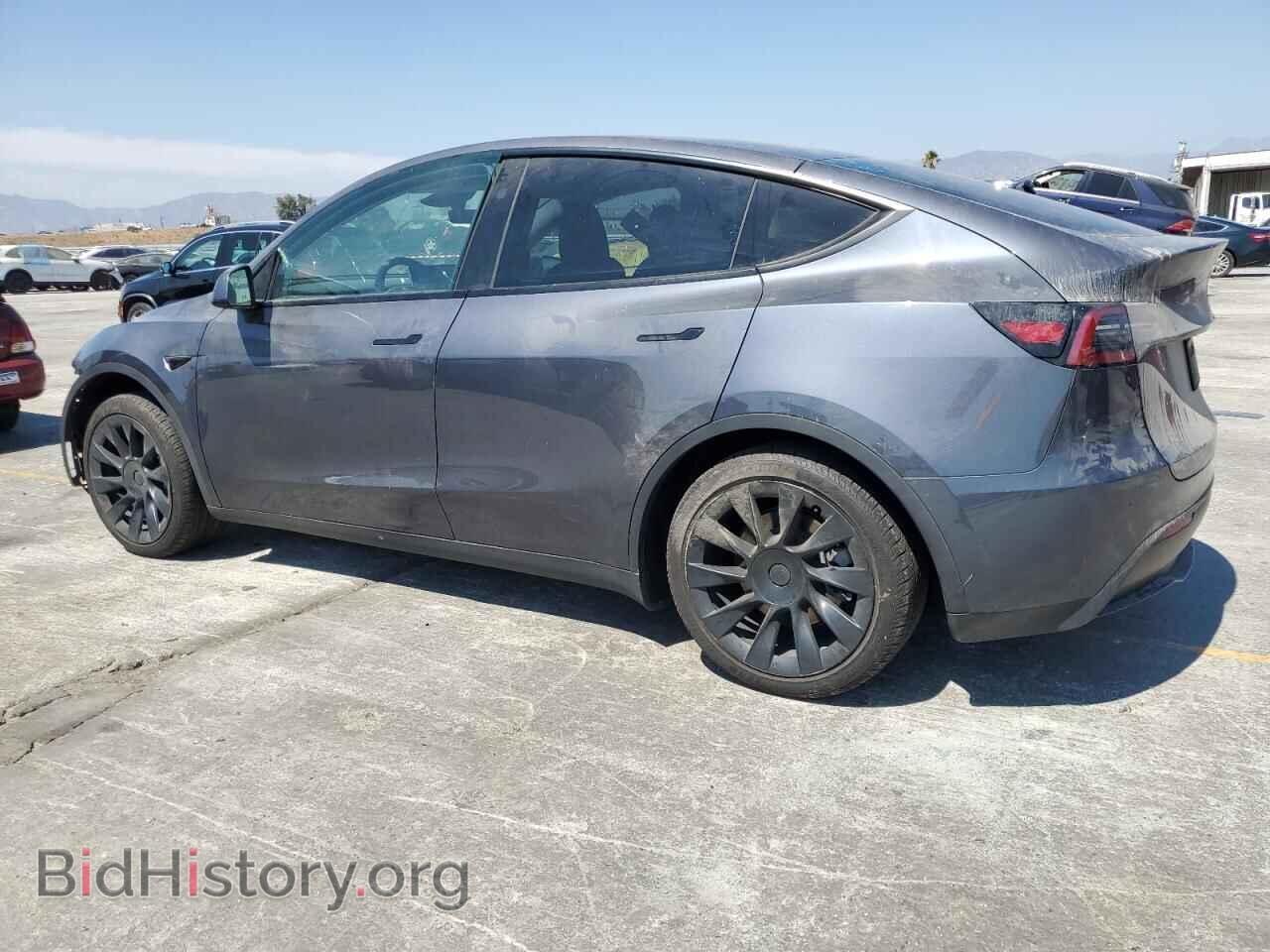 2023 TESLA MODEL Y - VIN: 7SAYGDED2PF962946 - Photo 2