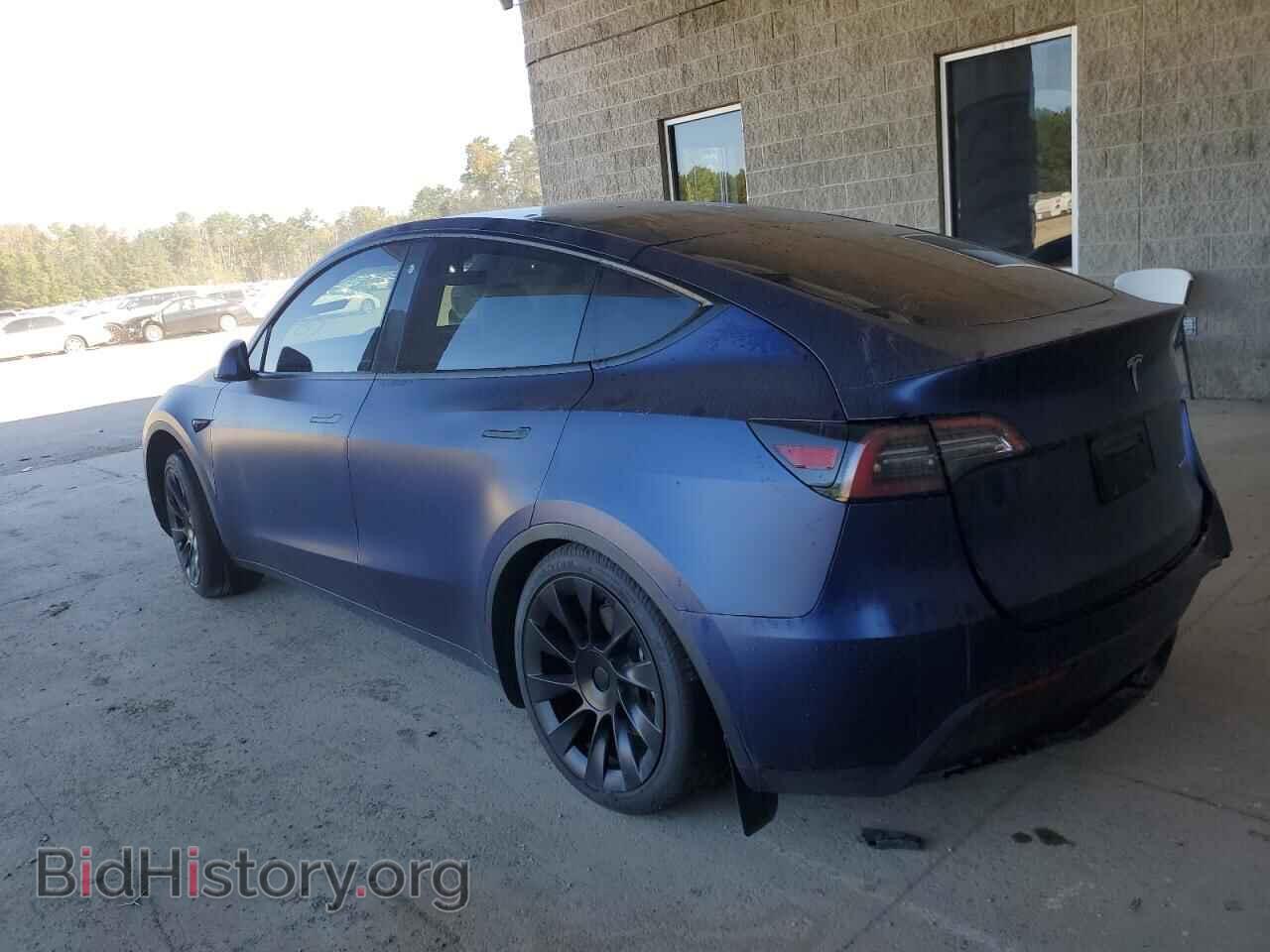 2023 TESLA MODEL Y - VIN: 7SAYGAEE7PF697030 - Photo 2