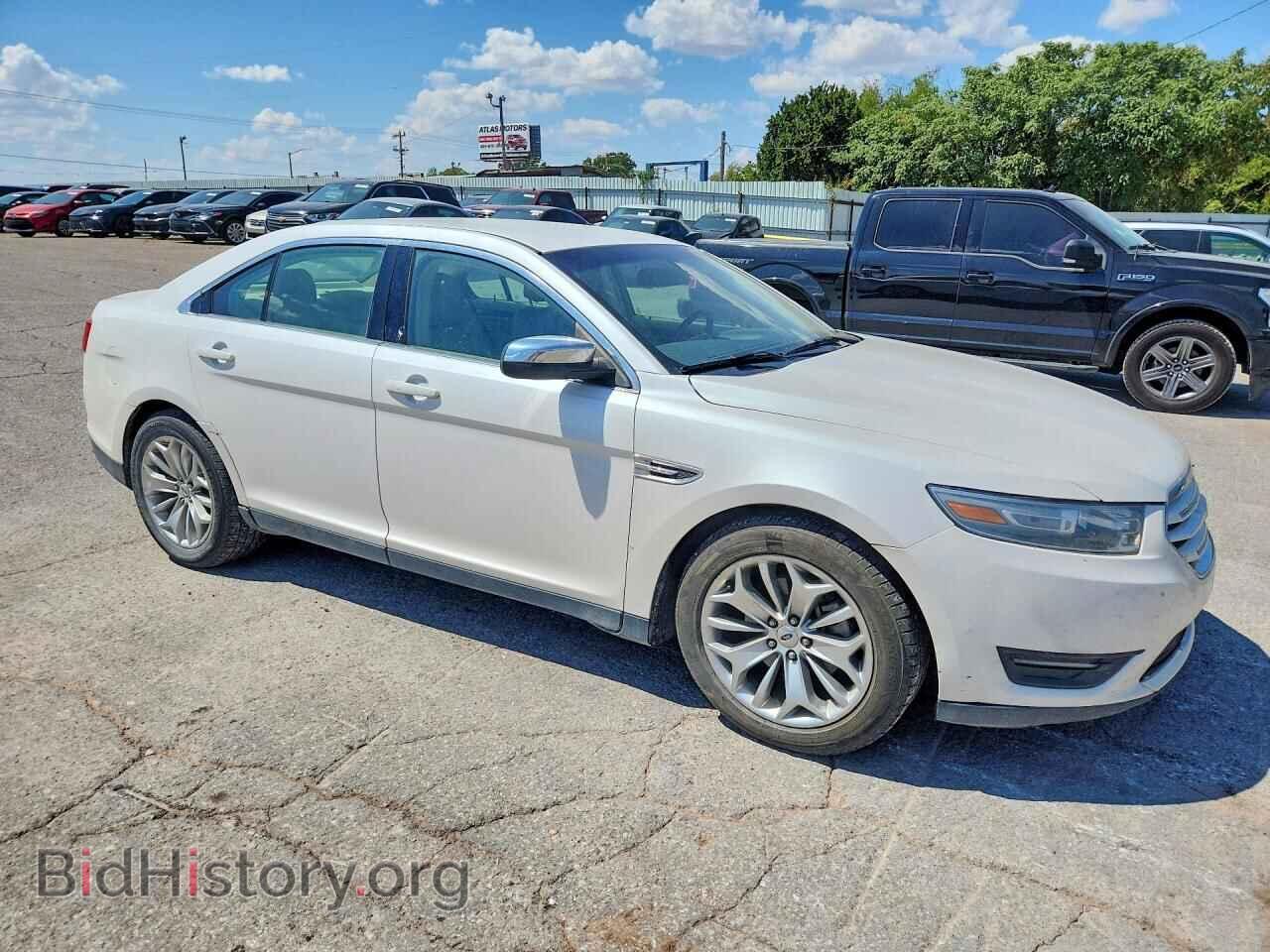2014 Ford TAURUS (VIN 1FAHP2F80EG125589) — photo 4 of 12