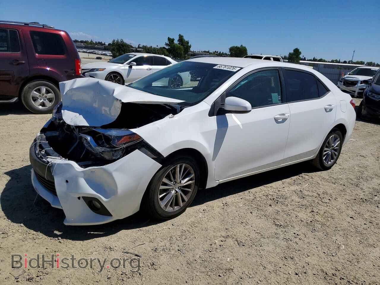 Фотография 5YFBURHEXEP023333 - TOYOTA COROLLA 2014