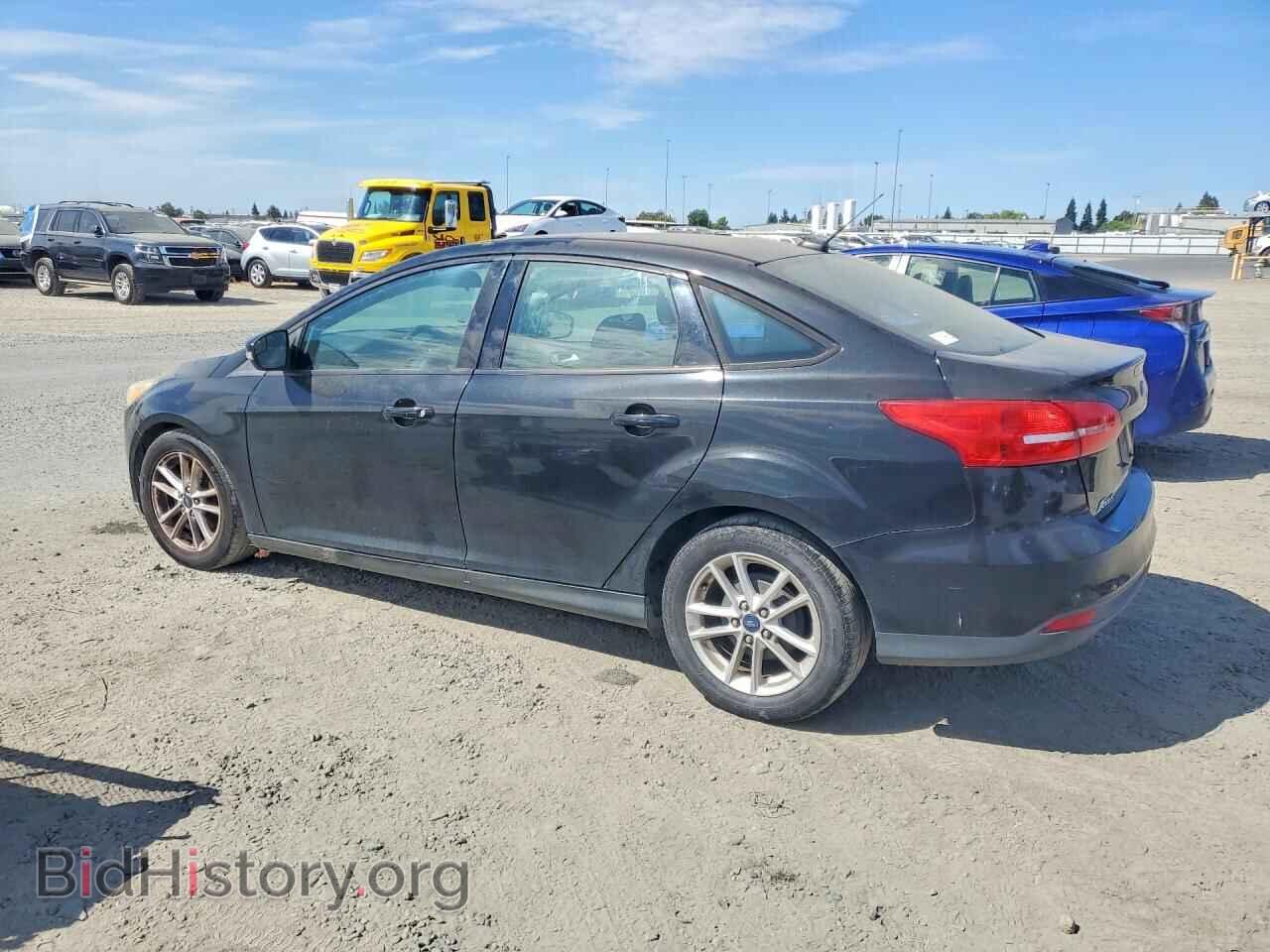 2015 FORD FOCUS - VIN: 1FADP3F28FL301569 - Photo 2