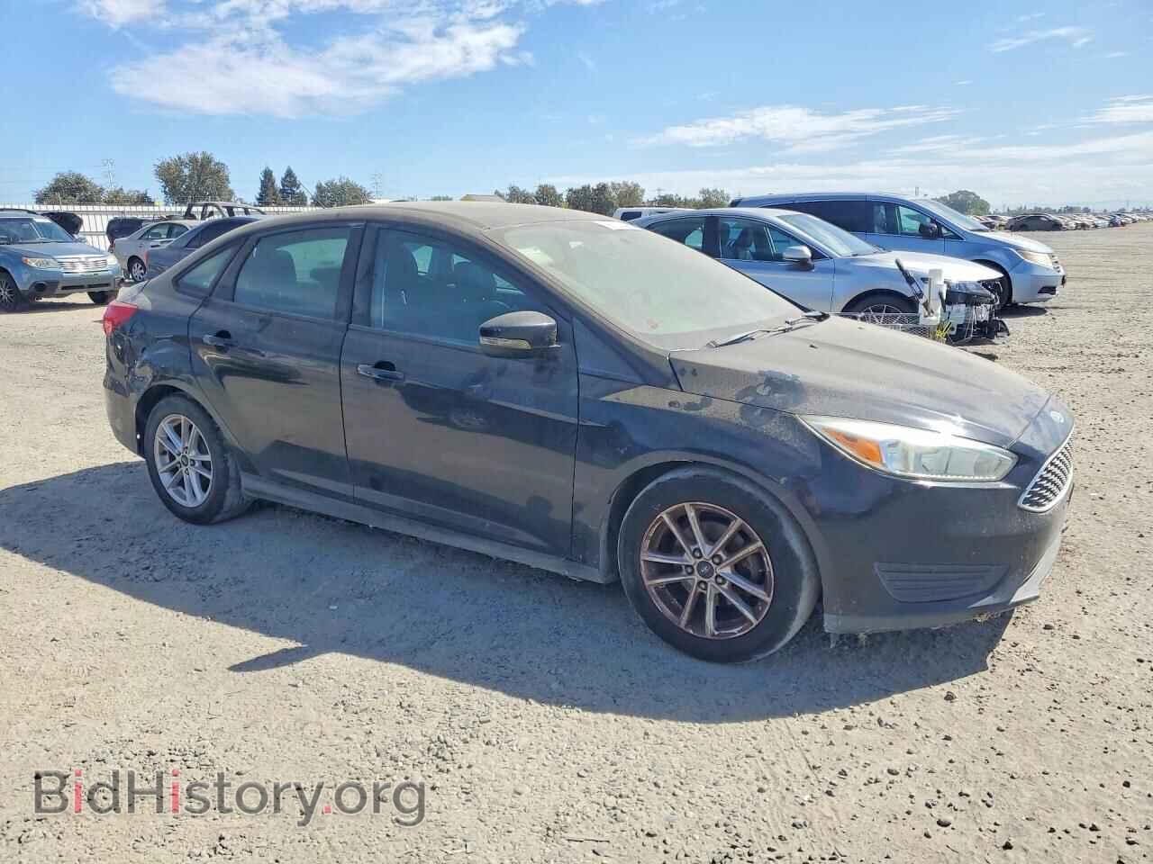 2015 FORD FOCUS - VIN: 1FADP3F28FL301569 - Photo 4