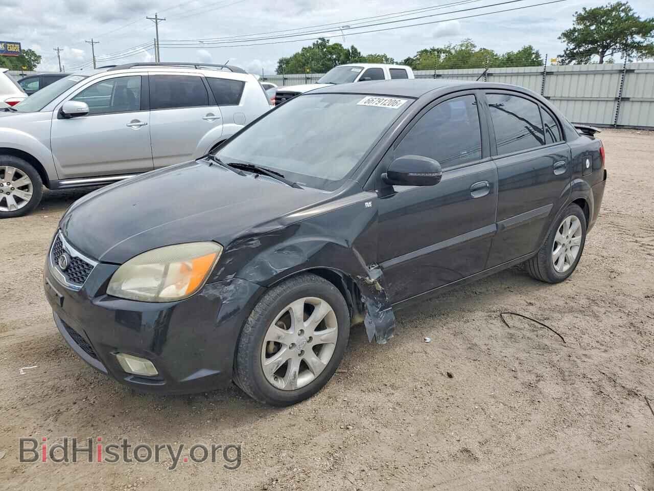 Фотография KNADH4A35B6911982 - KIA RIO 2011