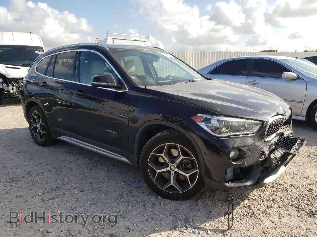 2017 BMW X1 - VIN: WBXHT3Z3XH4A55011 - Фото 4
