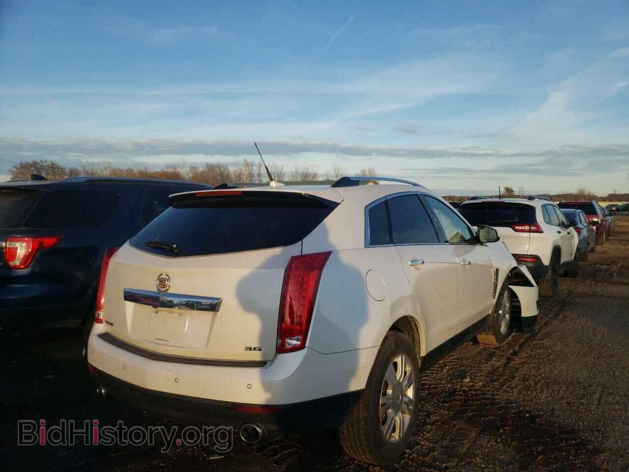 2012 CADILLAC SRX - VIN: 3GYFNAE35CS597593 - Фото 4