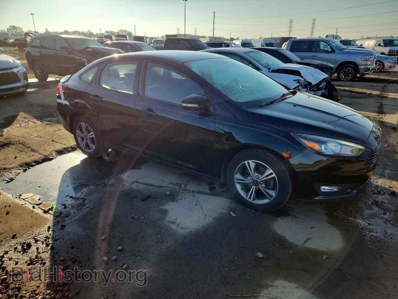 2017 FORD FOCUS - VIN: 1FADP3FE6HL302975 - Photo 4