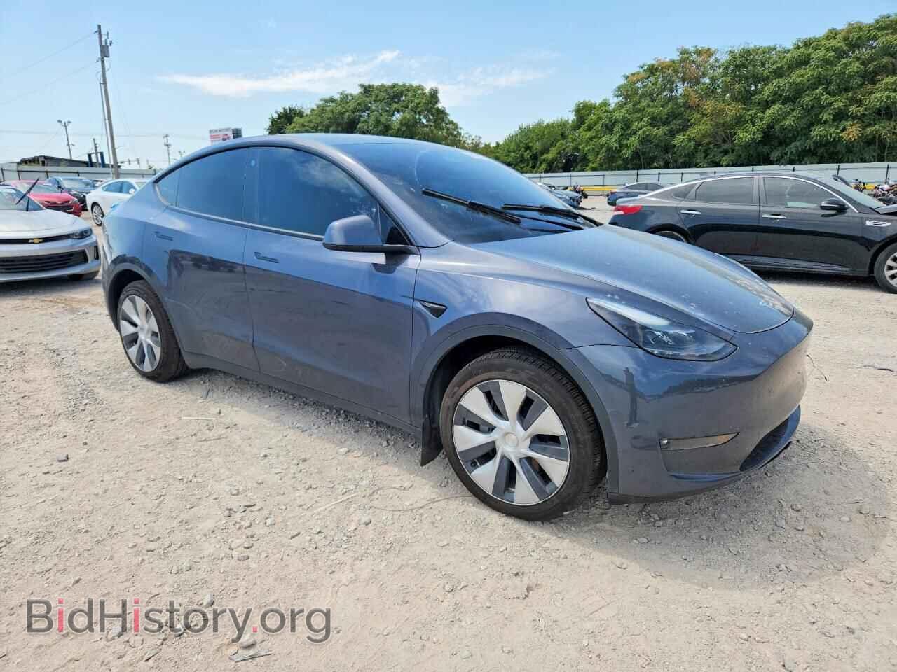 2023 TESLA MODEL Y - VIN: 7SAYGDEE1PF597748 - Photo 4