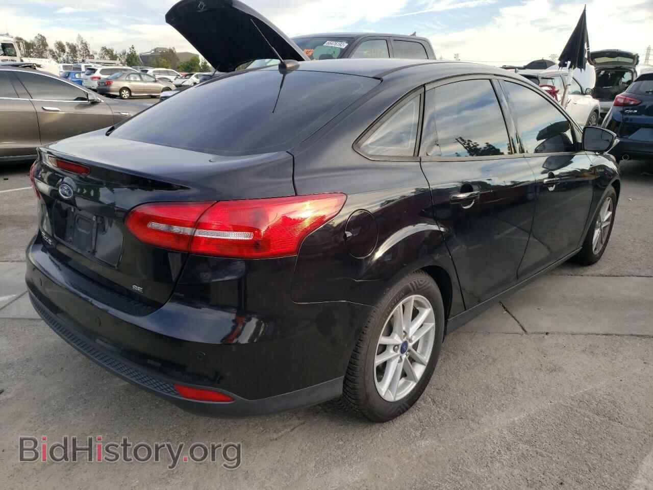 2016 FORD FOCUS - VIN: 1FADP3F25GL400674 - Фото 4