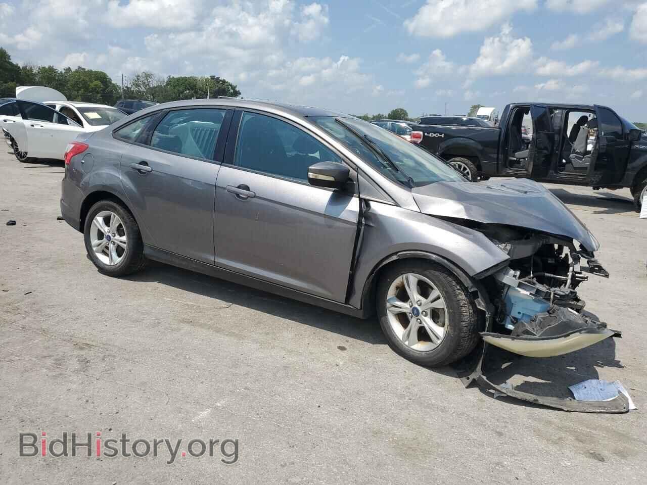 2014 FORD FOCUS - VIN: 1FADP3F21EL150573 - Photo 4