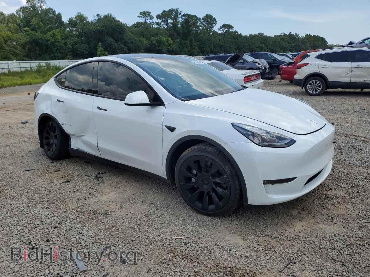 2023 TESLA MODEL Y - VIN: 7SAYGDEE5PF690904 - Photo 4