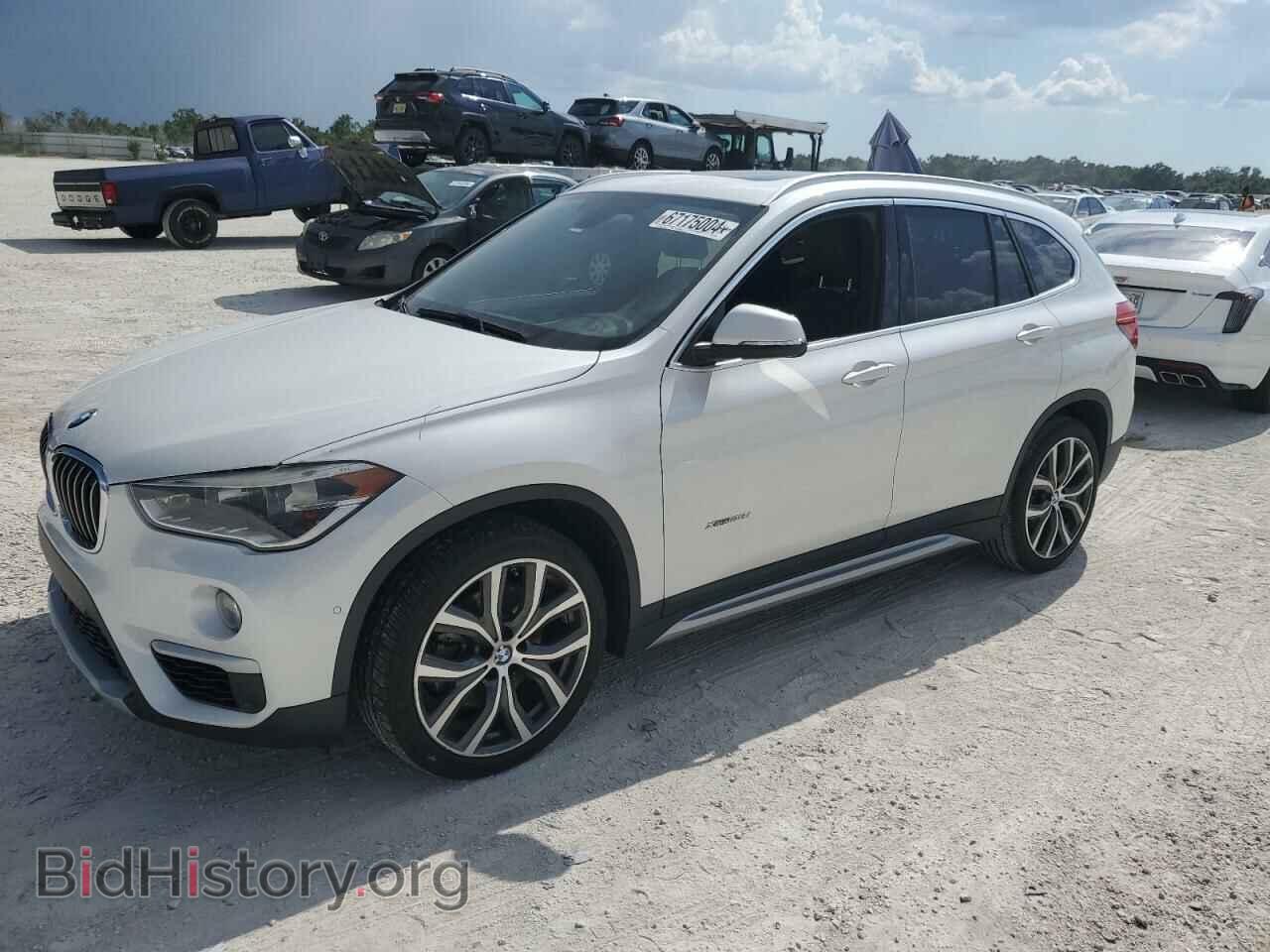Фотография WBXHT3C39G5E49665 - BMW X1 2016