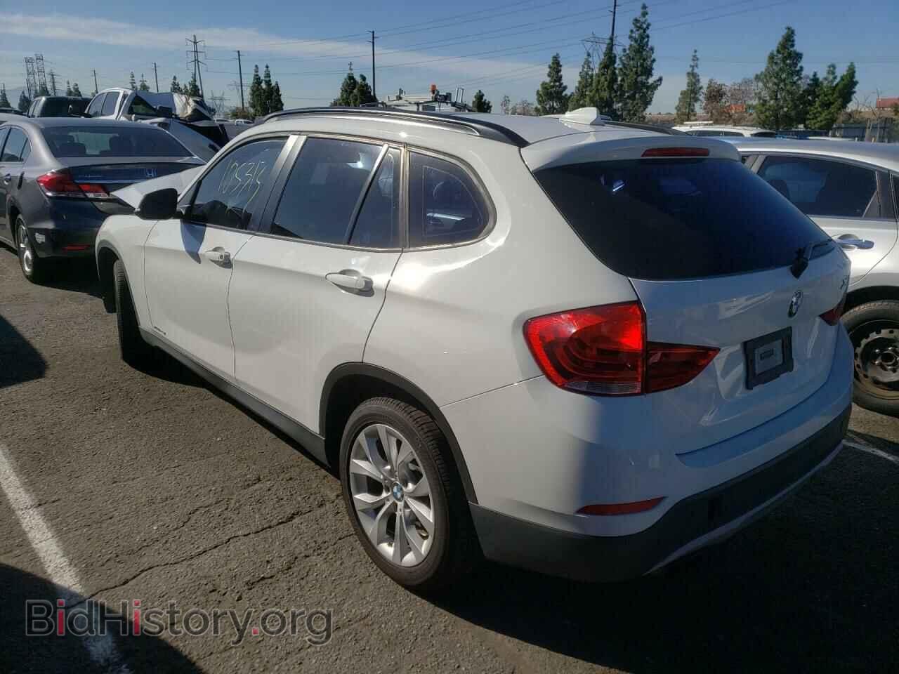 2014 BMW X1 - VIN: WBAVL1C54EVY16307 - Фото 2