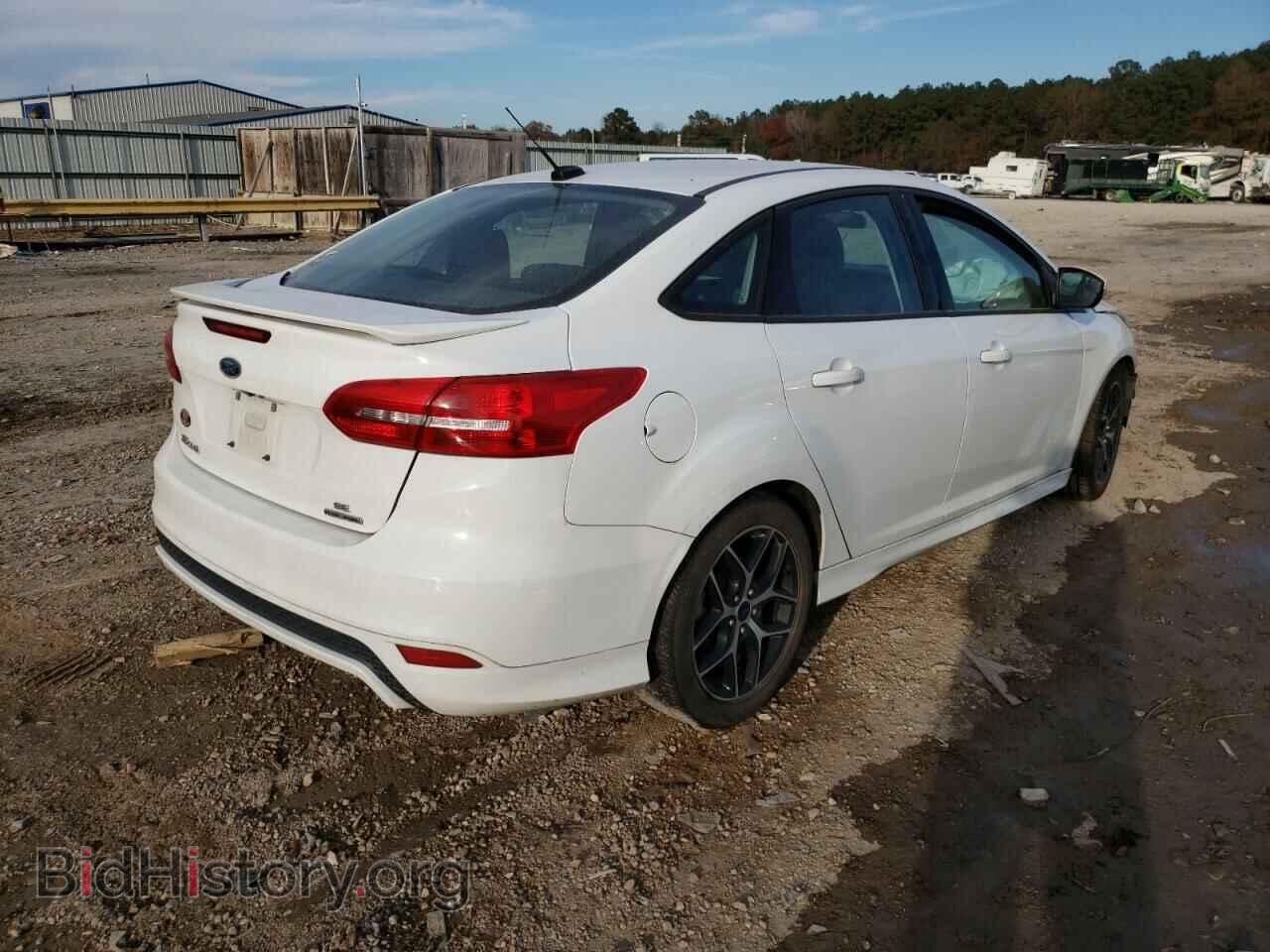 2016 FORD FOCUS - VIN: 1FADP3F27GL304612 - Photo 4