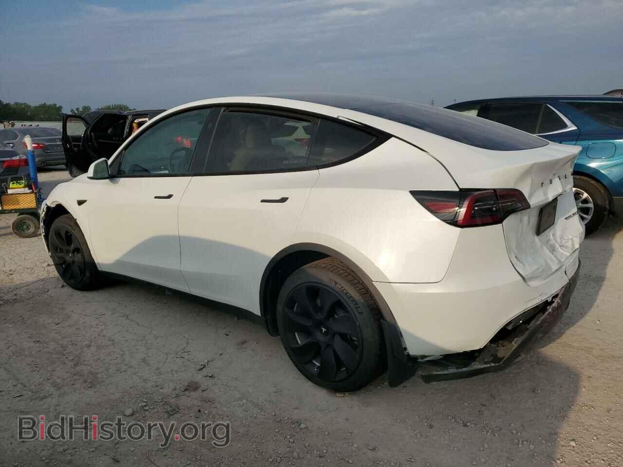 2023 TESLA MODEL Y - VIN: 7SAYGDEE4PF810174 - Фото 2