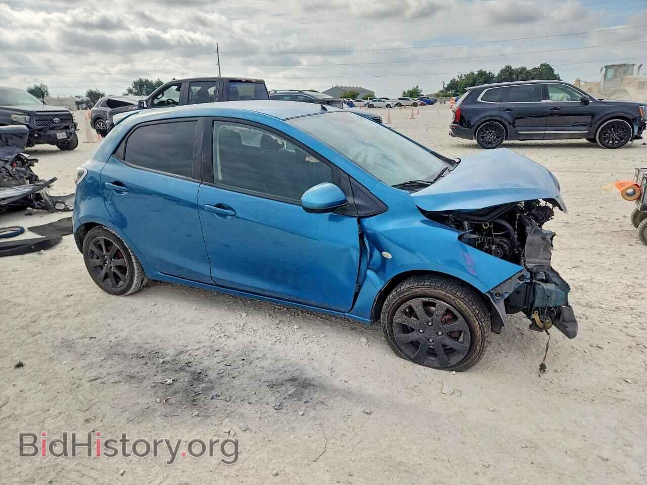 2012 Mazda 2 (VIN JM1DE1LY9C0148209) — фото 4 из 13