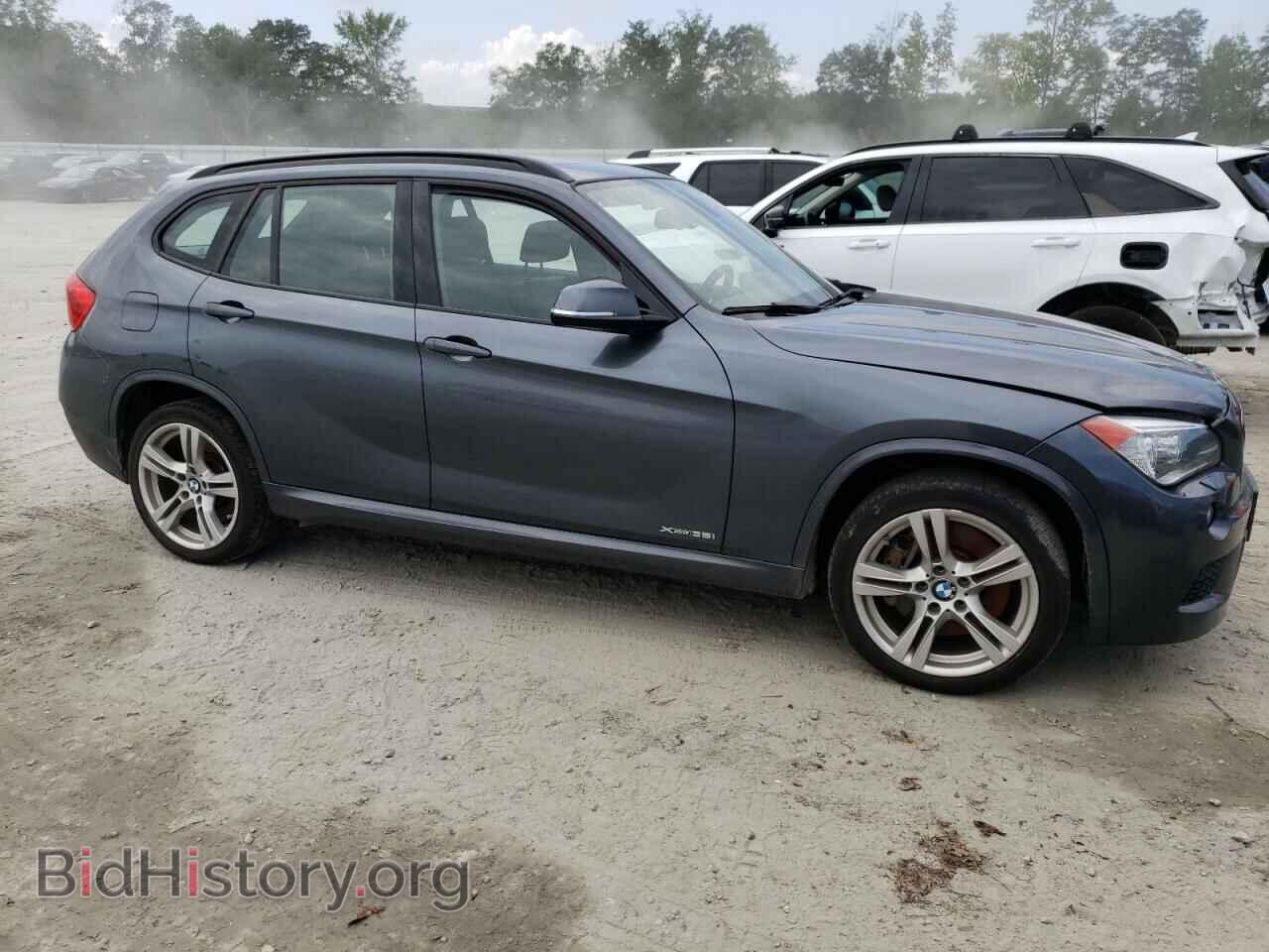 2014 BMW X1 - VIN: WBAVM5C55EVV91920 - Фото 4