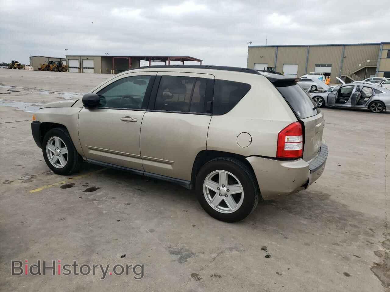 2010 JEEP COMPASS - VIN: 1J4NT4FA9AD506841 - Photo 2