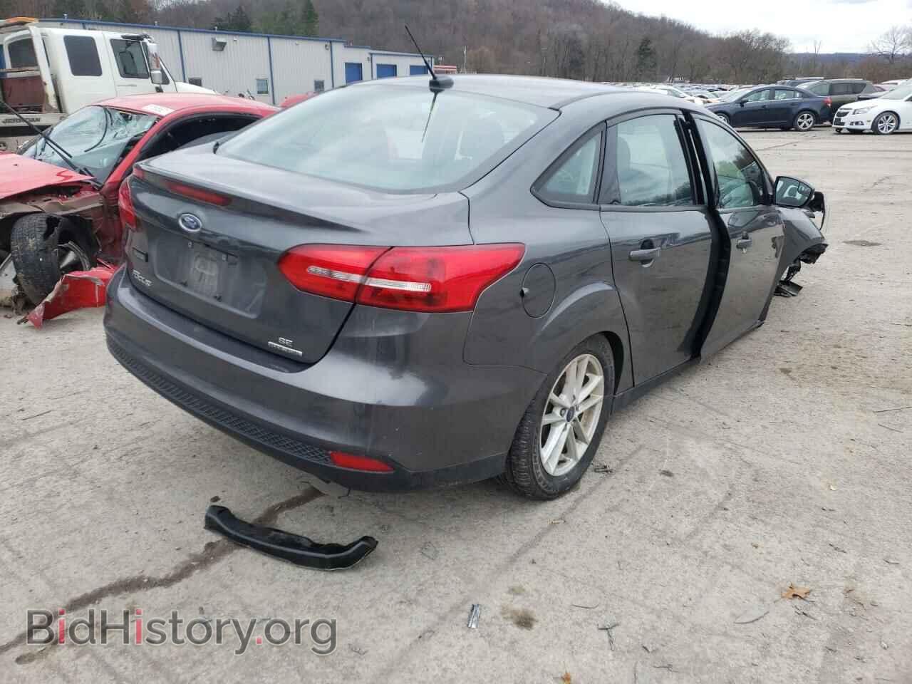 2016 FORD FOCUS - VIN: 1FADP3F22GL386409 - Photo 4