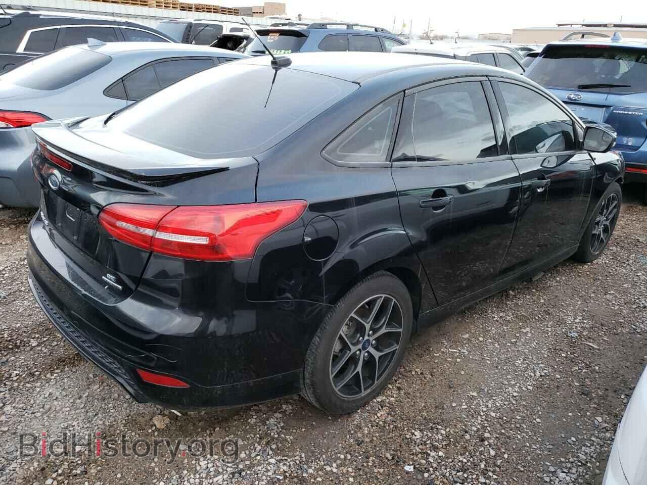 2016 FORD FOCUS - VIN: 1FADP3F2XGL374802 - Photo 4