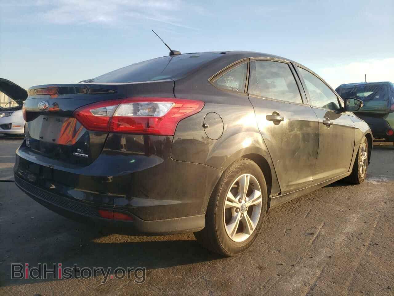 2014 FORD FOCUS - VIN: 1FADP3F2XEL102747 - Photo 4