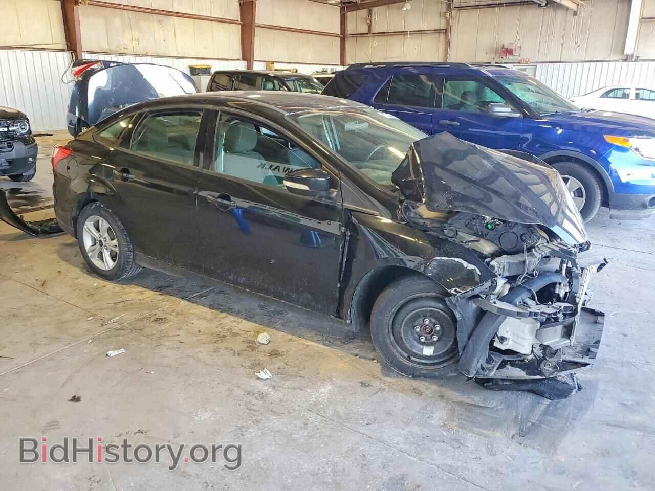 2014 FORD FOCUS - VIN: 1FADP3F23EL458943 - Photo 4