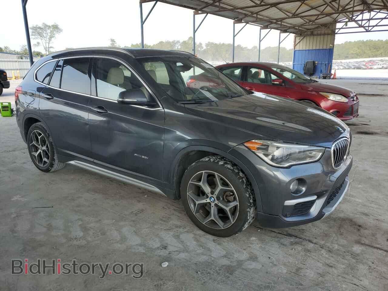 2017 BMW X1 - VIN: WBXHT3C3XH5F80038 - Фото 4