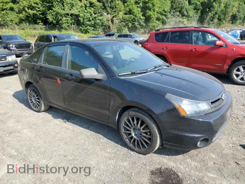 2011 Ford FOCUS (VIN 1FAHP3GN1BW157544) — photo 4 of 12