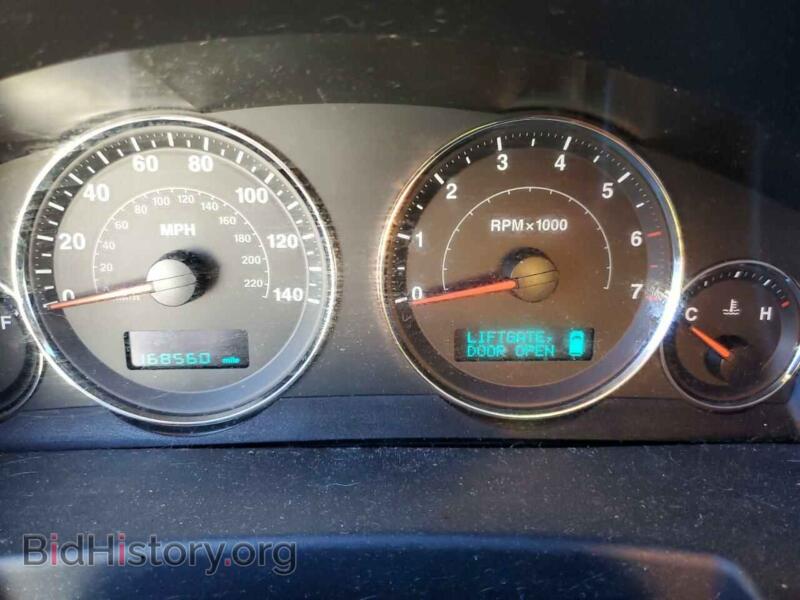 2007 Jeep COMMANDER (VIN 1J8HG582X7C528003) — photo 9 of 13