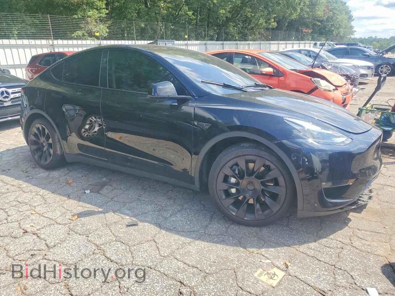 2023 TESLA MODEL Y - VIN: 7SAYGDEEXPF870069 - Photo 4