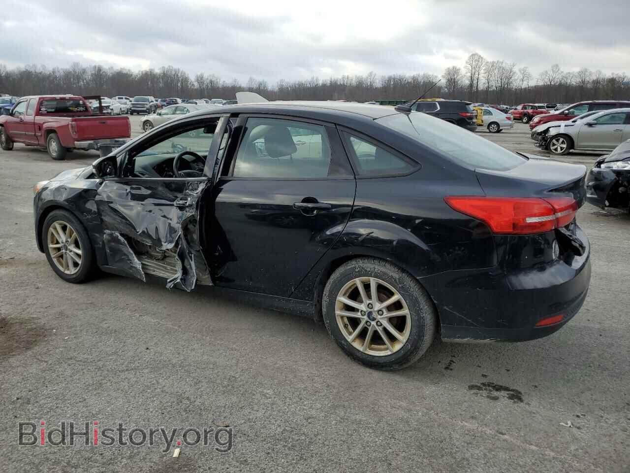 2016 FORD FOCUS - VIN: 1FADP3F24GL280785 - Фото 2