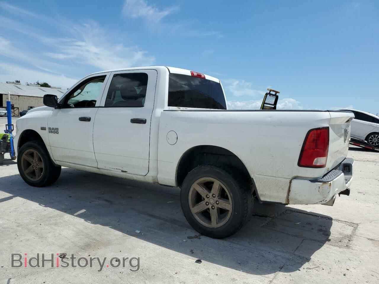 2014 RAM 1500 - VIN: 3C6RR7KT0EG229141 - Фото 2
