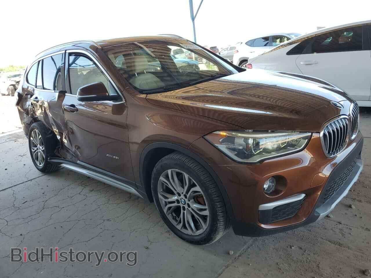 2016 BMW X1 - VIN: WBXHT3C30GP883703 - Фото 4