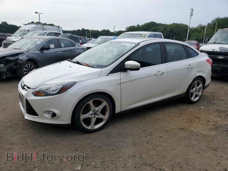 2012 Ford FOCUS Titanium (VIN 1FAHP3J22CL160356) — photo 1 of 12, Copart, damage: rear end