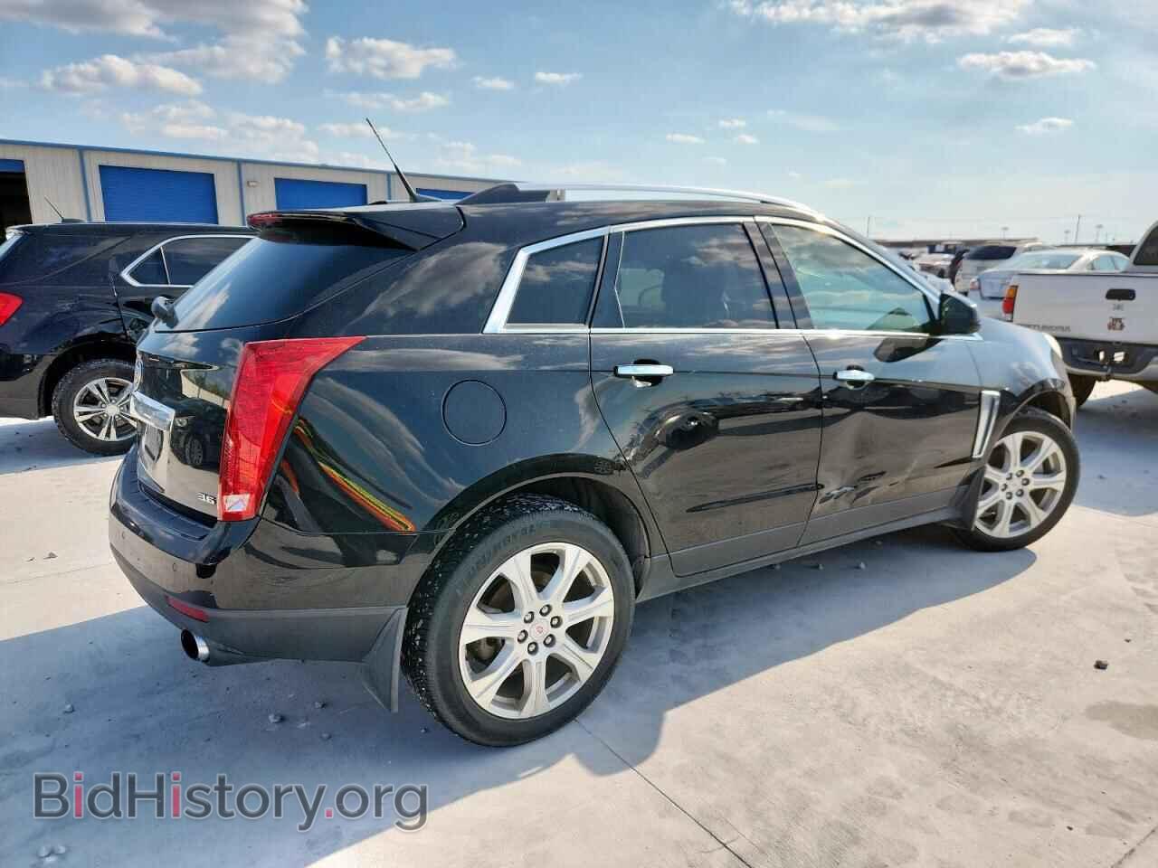 2014 CADILLAC SRX - VIN: 3GYFNCE37ES576730 - Фото 3