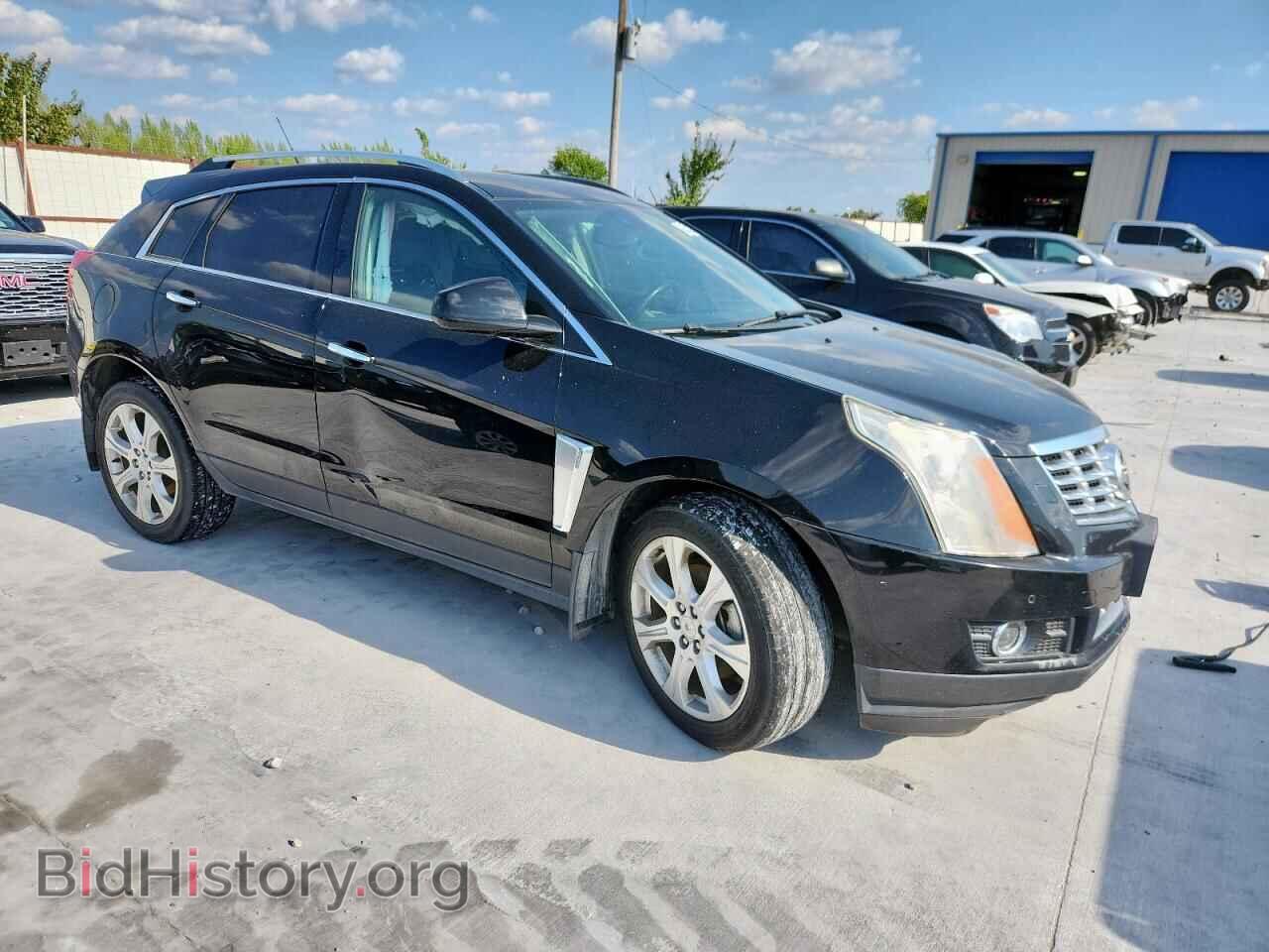 2014 CADILLAC SRX - VIN: 3GYFNCE37ES576730 - Фото 4