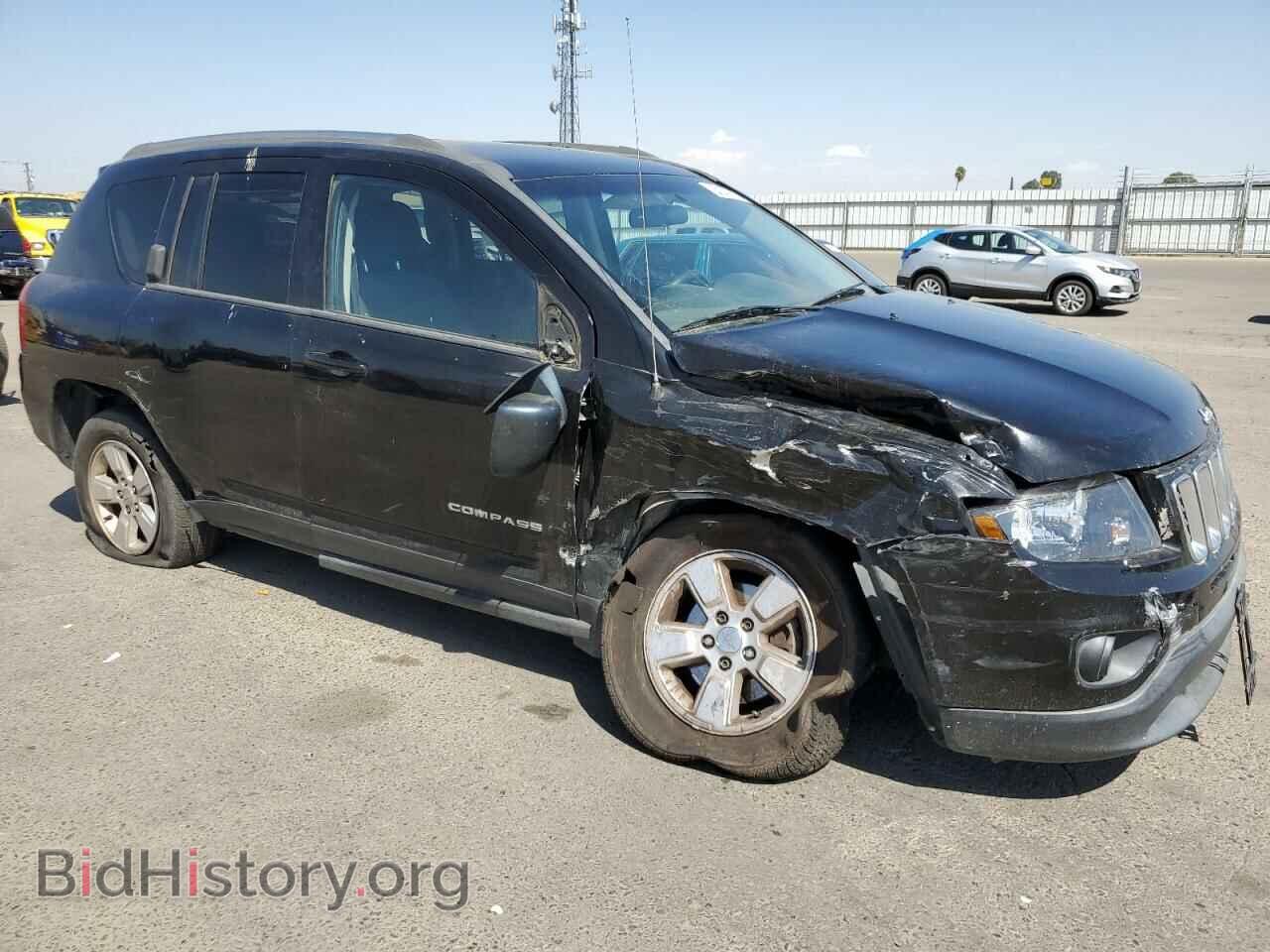 2014 JEEP COMPASS - VIN: 1C4NJCBA4ED882817 - Photo 4