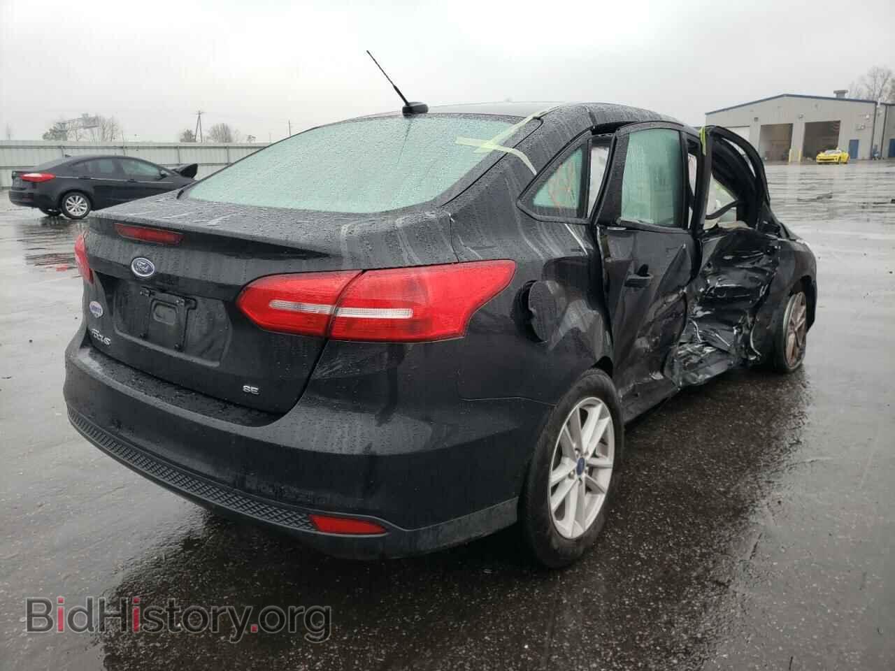 2017 FORD FOCUS - VIN: 1FADP3F22HL301635 - Photo 4