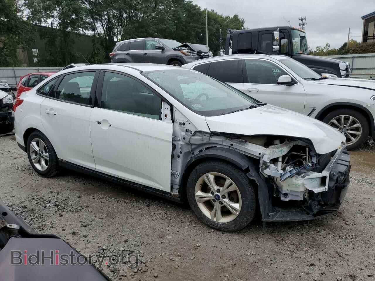 2014 FORD FOCUS - VIN: 1FADP3F21EL214997 - Photo 4