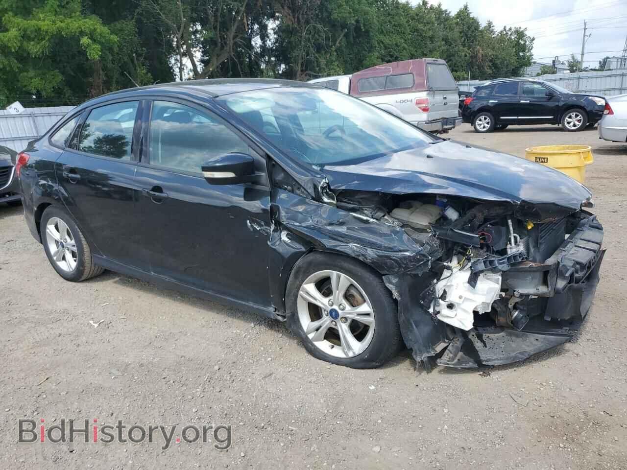 2014 FORD FOCUS - VIN: 1FADP3F2XEL394321 - Photo 4