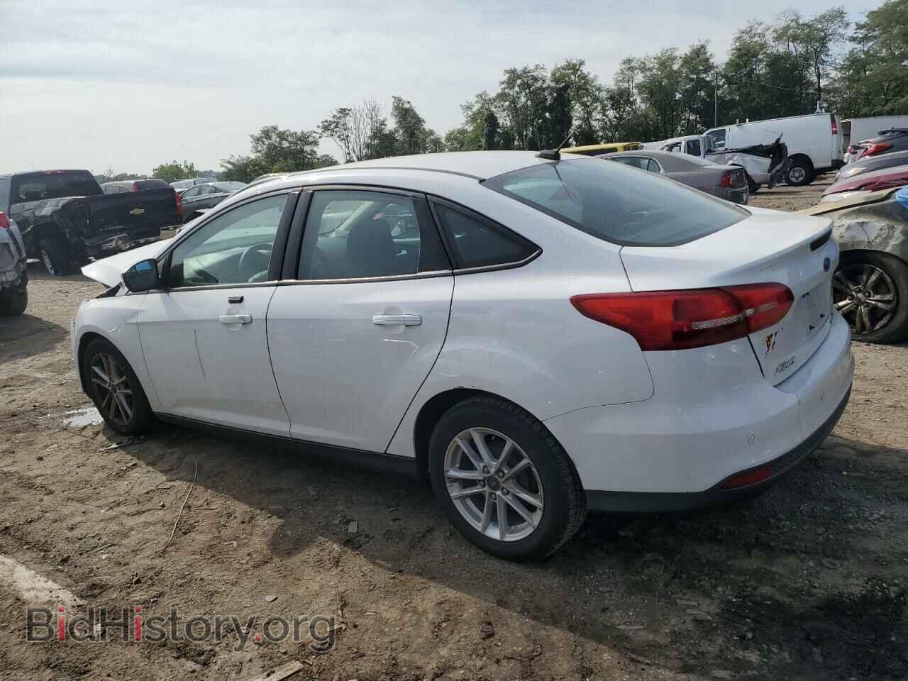 2016 FORD FOCUS - VIN: 1FADP3F21GL386465 - Фото 2