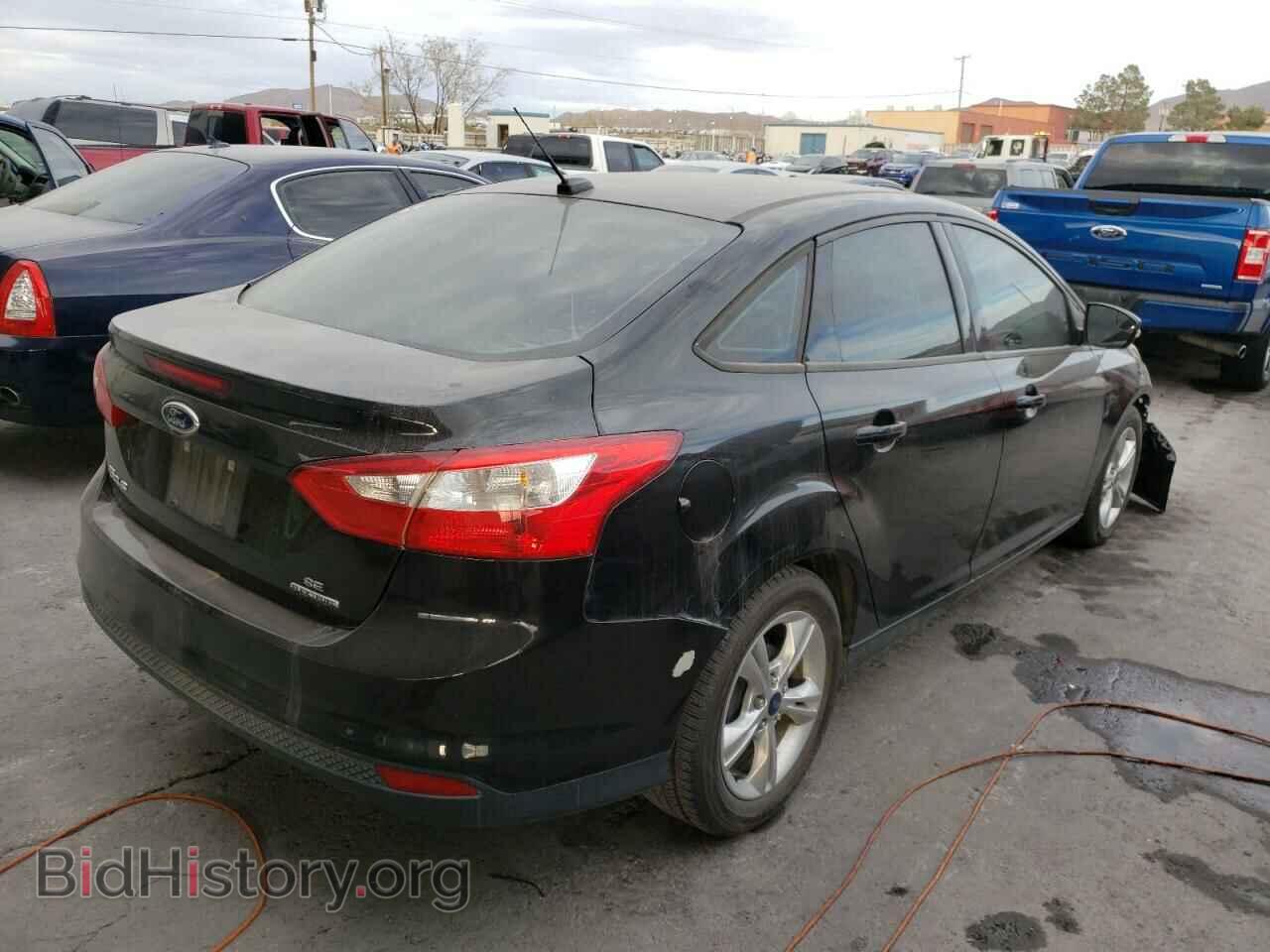 2014 FORD FOCUS - VIN: 1FADP3F20EL208317 - Photo 4